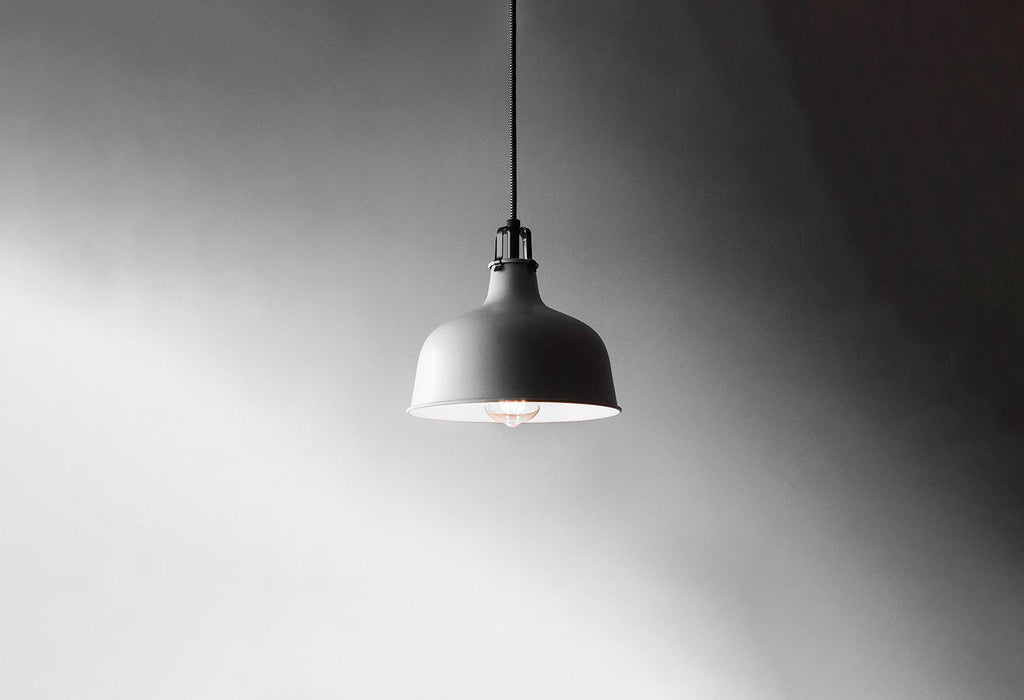 a light bulb in a pendant fixture